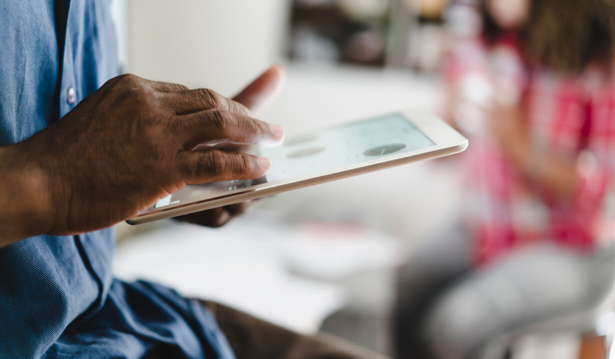 Doctor holding a tablet. 